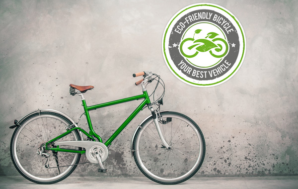 Druckmedien Aufkleber und Etiketten - gruenes Fahrrad vor grauer Betonwand 